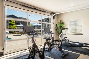 the gym at the enclave at woodbridge apartments in sugar land, tx at Altitude, East Wenatchee, WA, 98802
